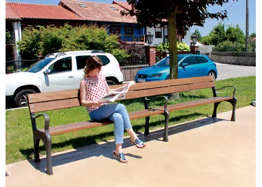 Banc long Arnía avec appui-bras en fonte et bois tropical